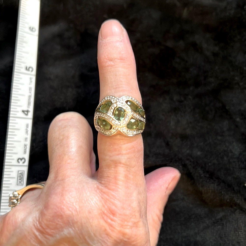14kt gold, Diamonds and tourmalines well made approx size 7 Ring. New.